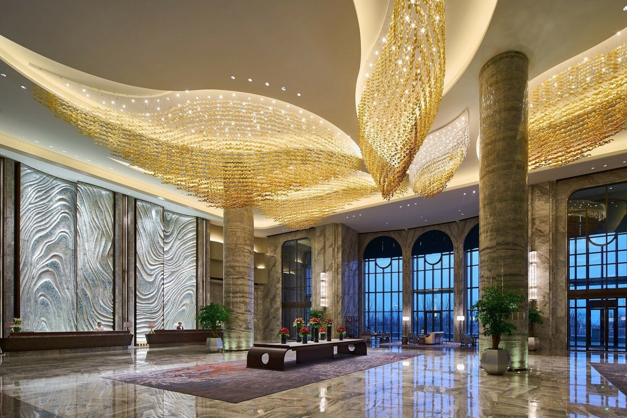 Отель Wanda Realm Qingdao Movie Metropolis Экстерьер фото